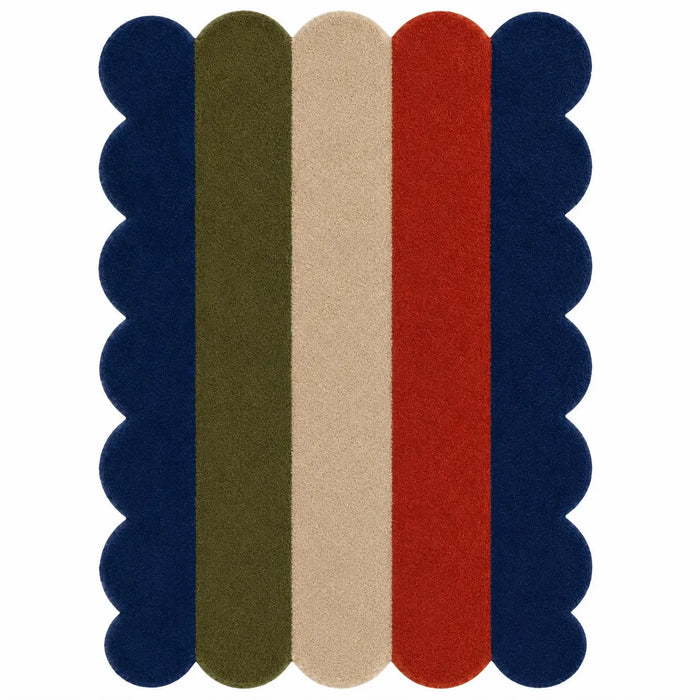 A rectangular area rug with a scalloped edge and vertical stripes in navy blue, olive green, beige, and red on a white background.