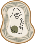 An abstract oval area rug with a minimalist line drawing of a face in profile, featuring a muted green circle on the cheek, set against a cream center with radiating gray lines and a tan border.