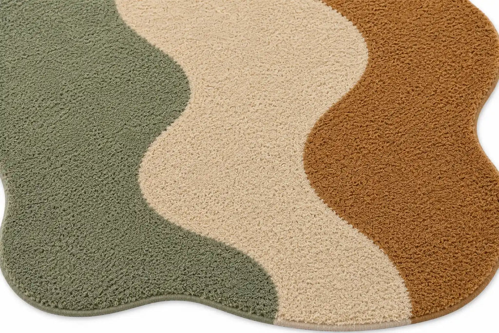 Wavy-patterned rug with green, beige, and brown colors on a white background