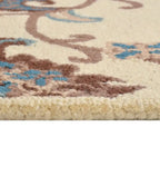 Classic ivory hand-tufted rug with Persian vine motif
