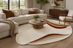 Living room with a beige sectional sofa, round wooden coffee table, and a colorful area rug.