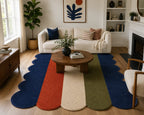 Living room with a colorful rug and a white sofa.