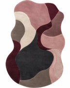 Multicolored abstract rug with wavy patterns on a white background