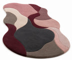 Multicolored abstract rug with wavy patterns on a white background