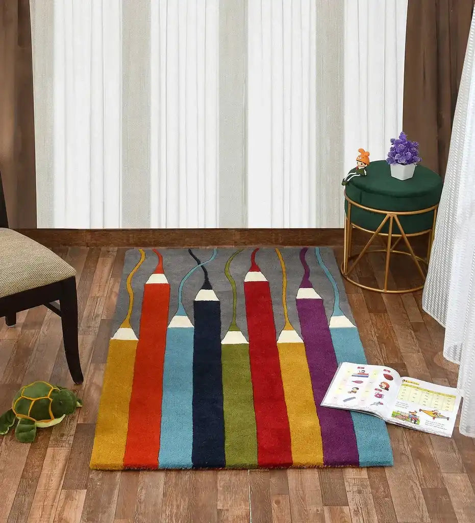 Colorful hand-tufted wool carpet with pencil design on wooden floor in cozy room