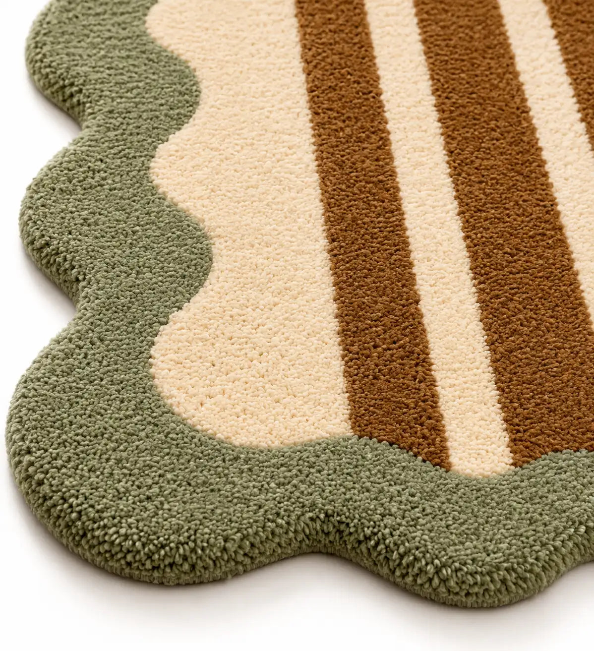 Textured rug with wavy edge and striped pattern in green, beige, and brown on a white background