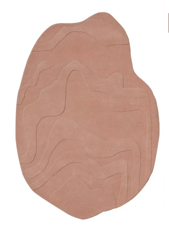 Brown abstract rug on a white background
